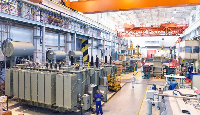 Engineers on an industrial automation plant floor